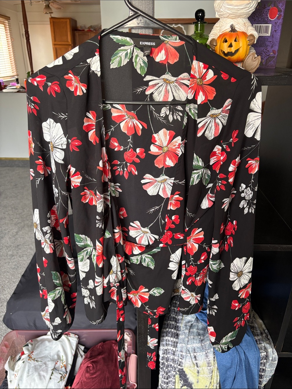 Express Black Floral Wrap Blouse with Red, White & Green Accents